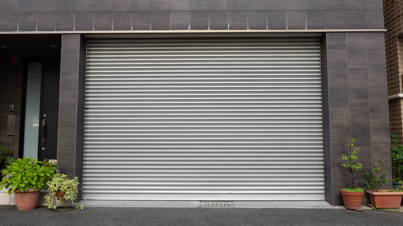 POSE / INSTALLATION DE RIDEAU MÉTALLIQUE